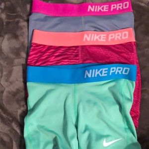 3 pairs of nike pros